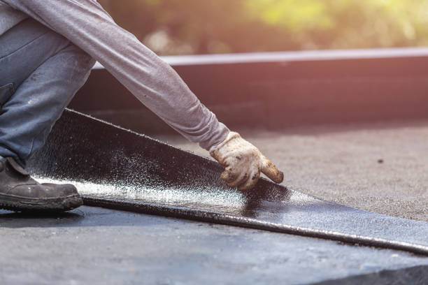 Professional Waterproofing technician working in Rochelle, IL